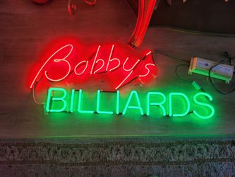 $30 neon Sign in glass
