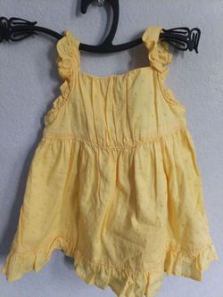 Baby girl dresses size  0-3 months, one in size 6 months