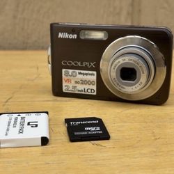 Nikon Coolpix S210 8.0MP Digital Camera Plum W/New Battery , SD Card Lens Error
