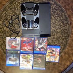PS4 Console with Two Controllers And 7 games