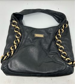 Authentic used mk Michael kors bag black and gold purse