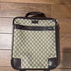 Authentic Gucci brown Coated Canvas Carry On Serial/ Date Code 002122