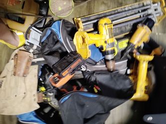 Bag full of power tools and chargers
