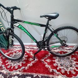 Schwinn Sidewinder Mountain Bike, 26-inch Wheels, 21 Speeds, Black / Green