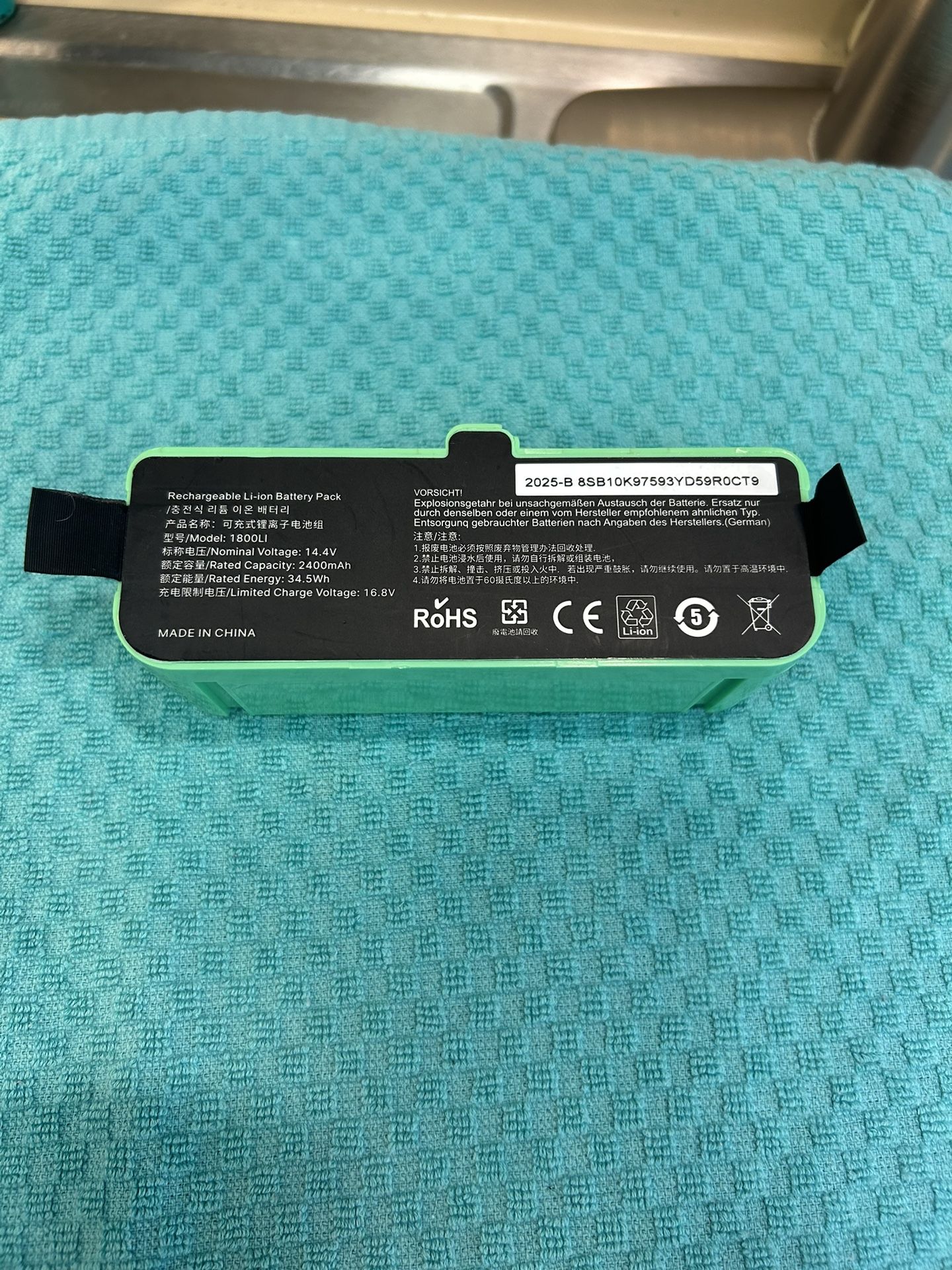 model 1800LI rechargeable lithium-ion battery pack, likely a replacement battery for an iRobot Roomba vacuum cleaner. Model: 1800LI Nominal Voltage: