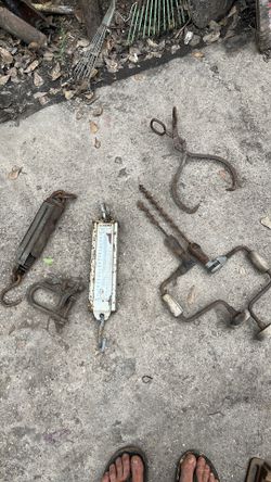 Antique scales shackles vise and drills