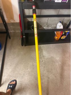 Yellow extension pole.