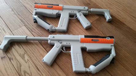 Two PS3 Move Sharp Shooter guns with compatible games for sale!