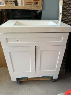 30" NEW WITH DAMAGE BATHROOM VANITY