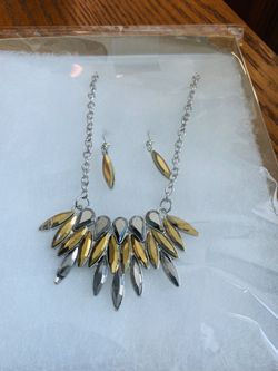 Very unique but elegant boxed gold and silver mirrored necklace & earrings set