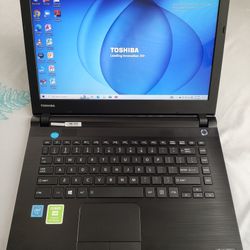 14"inch Intel Celeron Toshiba Laptop, 32GB eMMC, 2GB RAM, Inbuilt Bluetooth, SD Card Reader, HDMI And a WebCam. Windows 10 Installed.