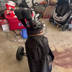 Golf Clubs, Bag, And Cart