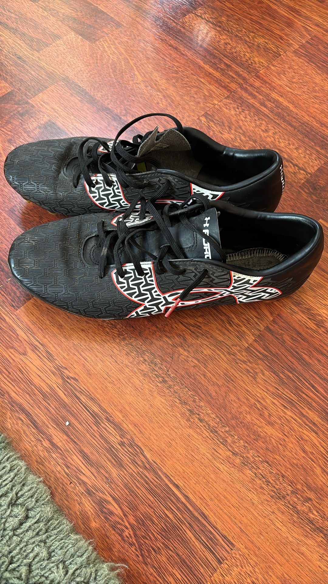 This is a pair of Under Armour Soccer Cleats