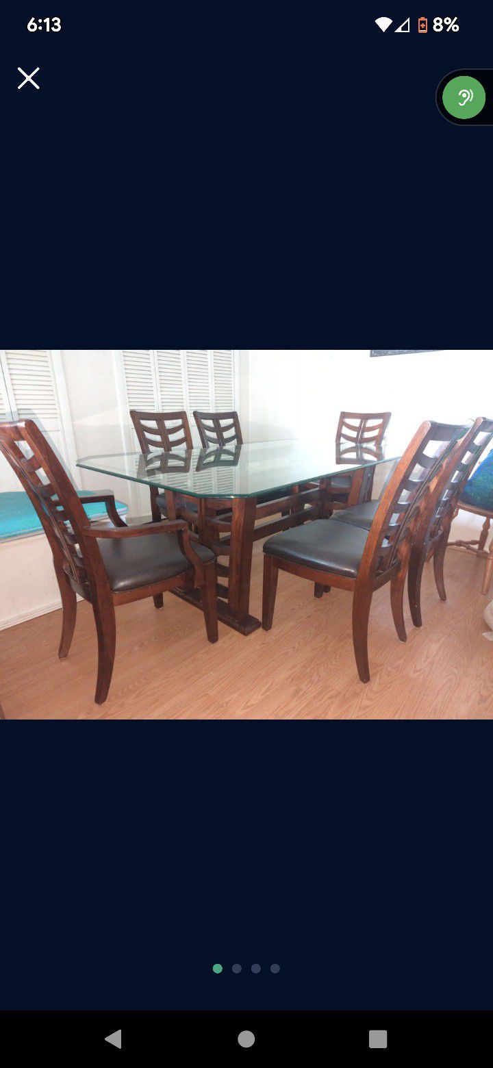 Beautiful Dining Room Table Glass Top Six Leather Chairs