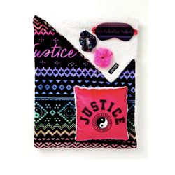 Reusable tote with faux fur trim and handles and printed Justice logo • Dreamers Print double ply blanket; fleece with sherpa backing. • Gift Tag with