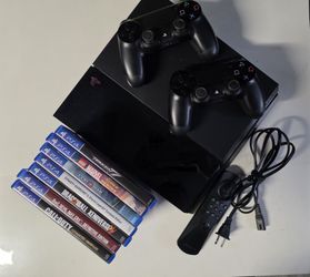PS4 Playstation 4 With 2 Controllers, Remote, & Games
