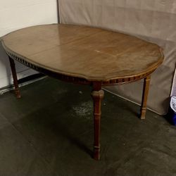 Antique dining table 1950s. Comes with table leaf. Must go this week