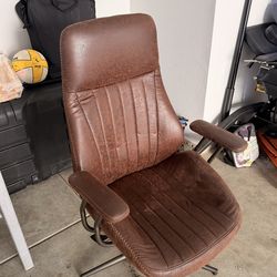 brown vintage rolling desk chair