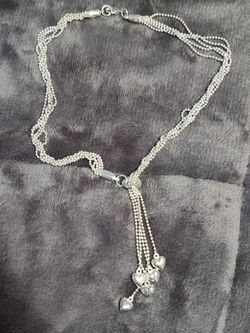 Tiffany's necklace and bag