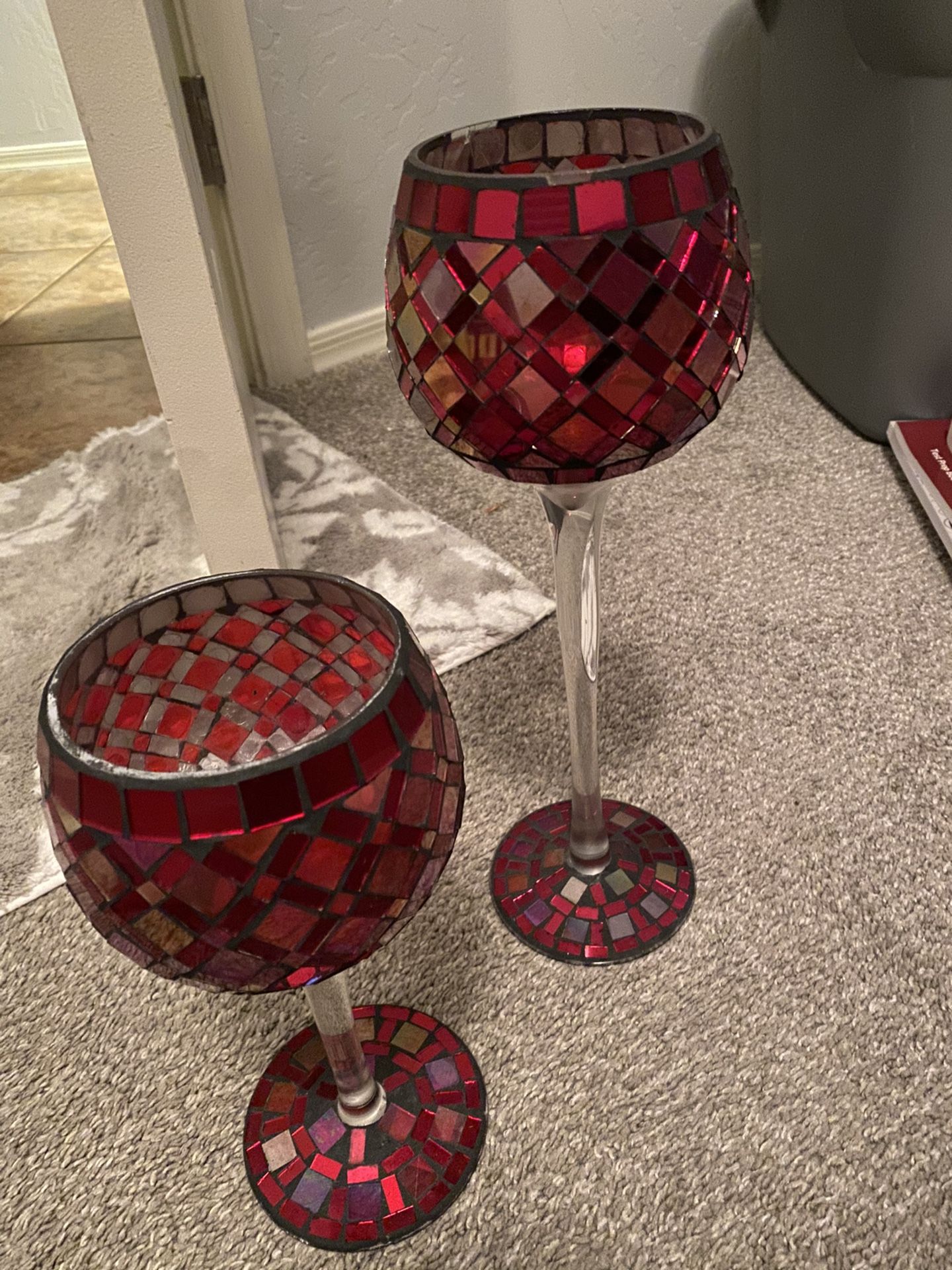 Holiday / Christmas red home decor. Glass candle holders, candles on decorative cups, set of throw pillows, wood vase and lamp shade
