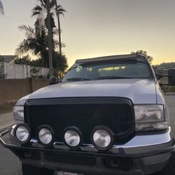1999 Ford F250 Super Duty Crew Cab · 10v