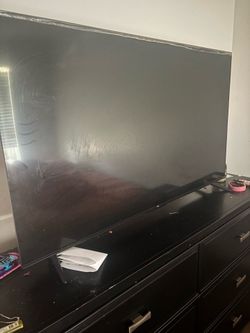BLACK TCL roku TV  2024