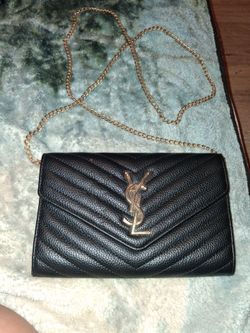 Saint Laurent (YSL)