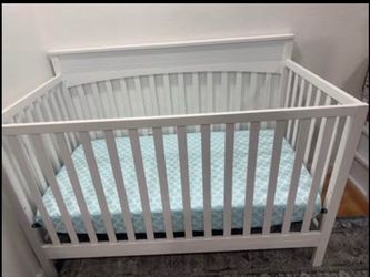 Baby crib with mattress