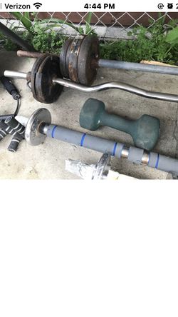 Lot of steel weights with lifting bars and dumbbells used - $80 - $80 (burbank)