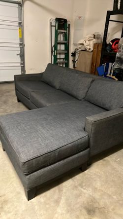 Grey couch with Chase
