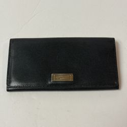 Tumi wallet black leather.