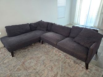 Sectional sofa with matching throw pillows