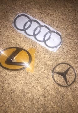 Mercedez , Lexus , Audi emblems