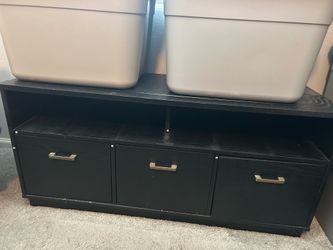 Black Cabinet under window,