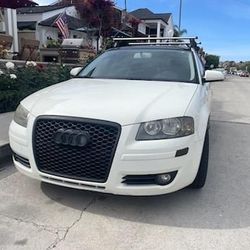 White 2006 Audi A3.