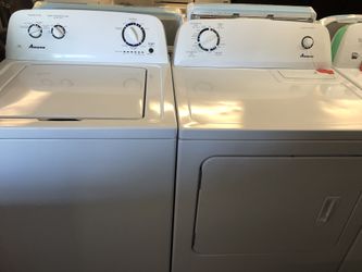 Used Amana High Efficiency washer and dryer set. 1 year warranty