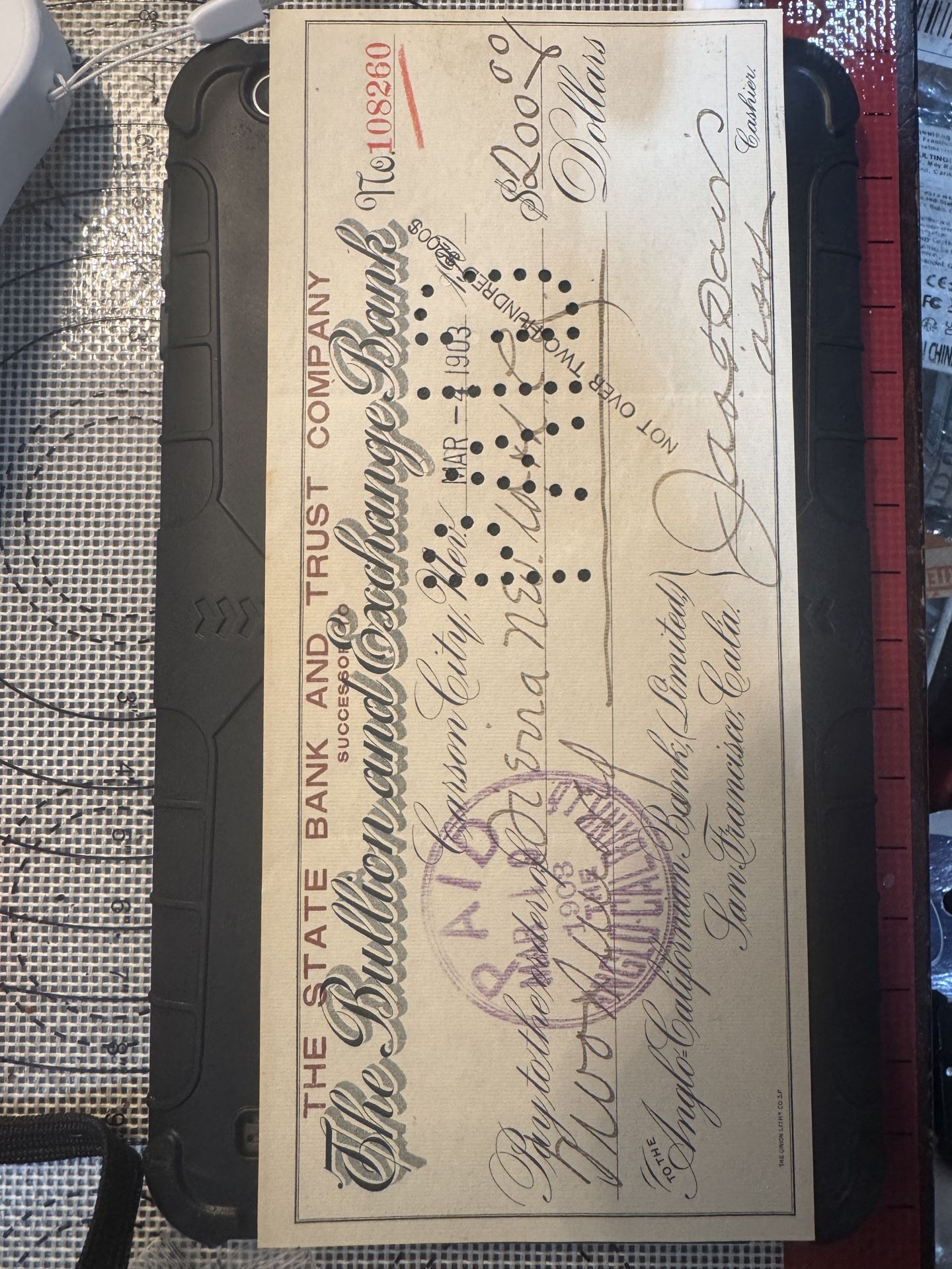 This is a check from The Bullion and Exchange Bank dated March 4, 1903.