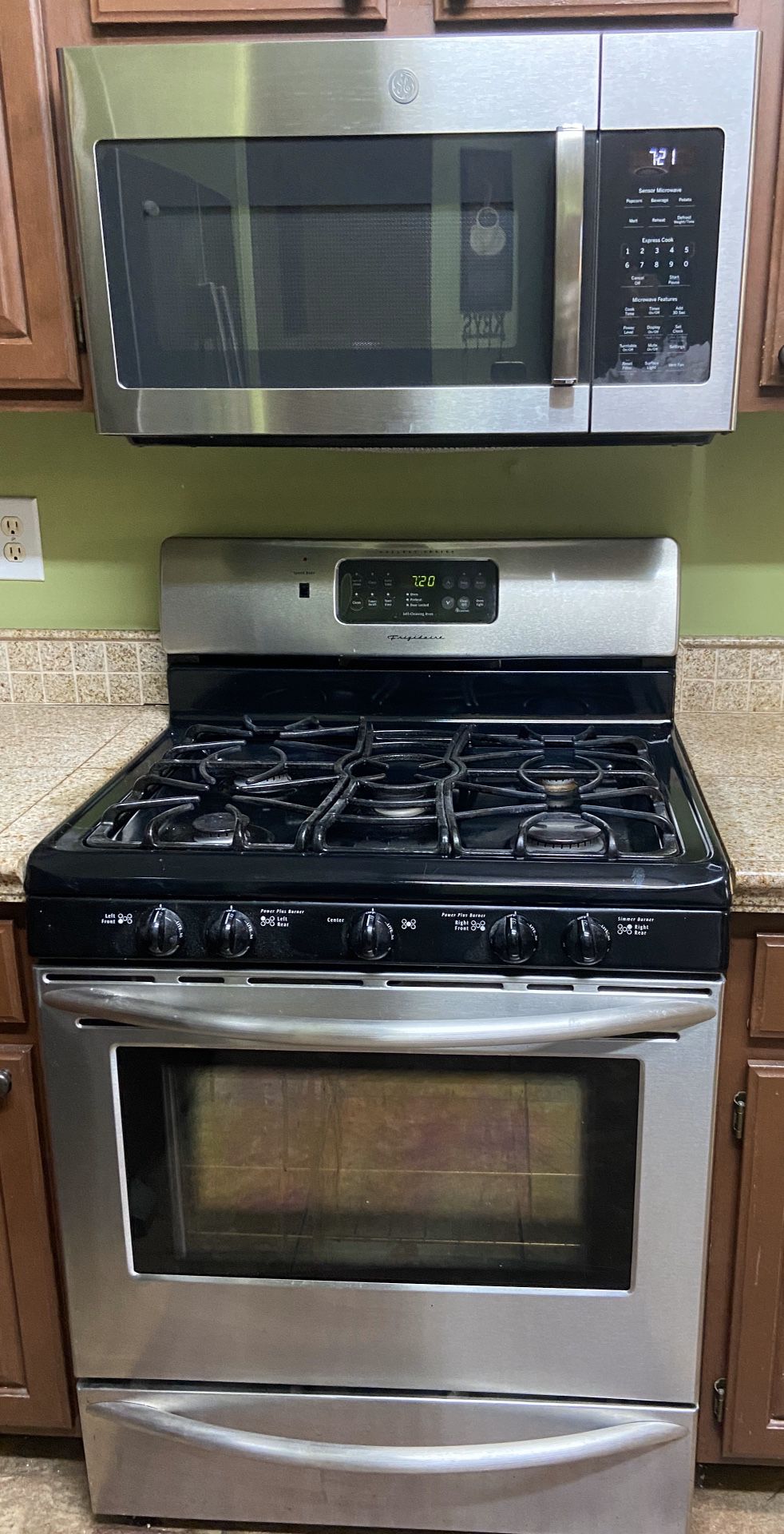 Stainless steel Gas Stove and Dishwasher $325. Microwave and fridge are sold.
