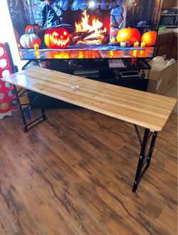 New adjustable height table with umbrella holder