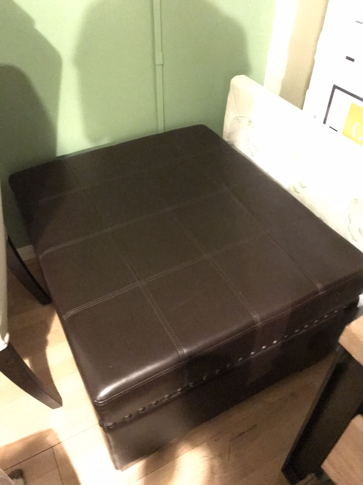 Leather ottoman with storage