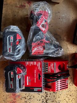 Milwaukee Drill with batteries and charger