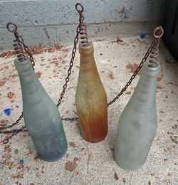 Glass bottle candle holders