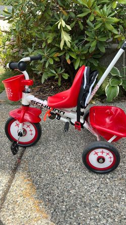 Tricycle with push/steer handle