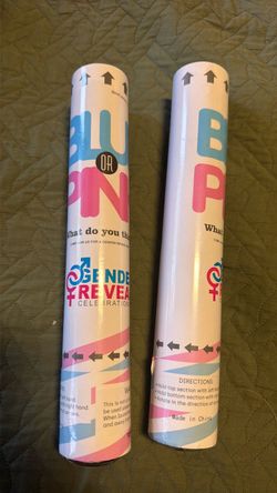 Two pink confetti poppers