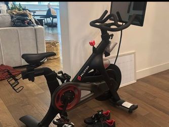 Peloton Bike and 2 pairs of shoes
