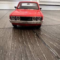 Diecast 1/24 scale 1973 Datsun 620 Pickup Truck  Model by Maisto  
