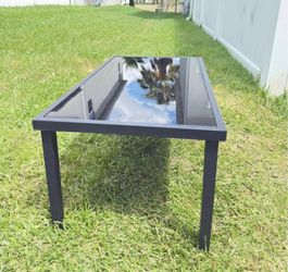 Selling a black coffee table.