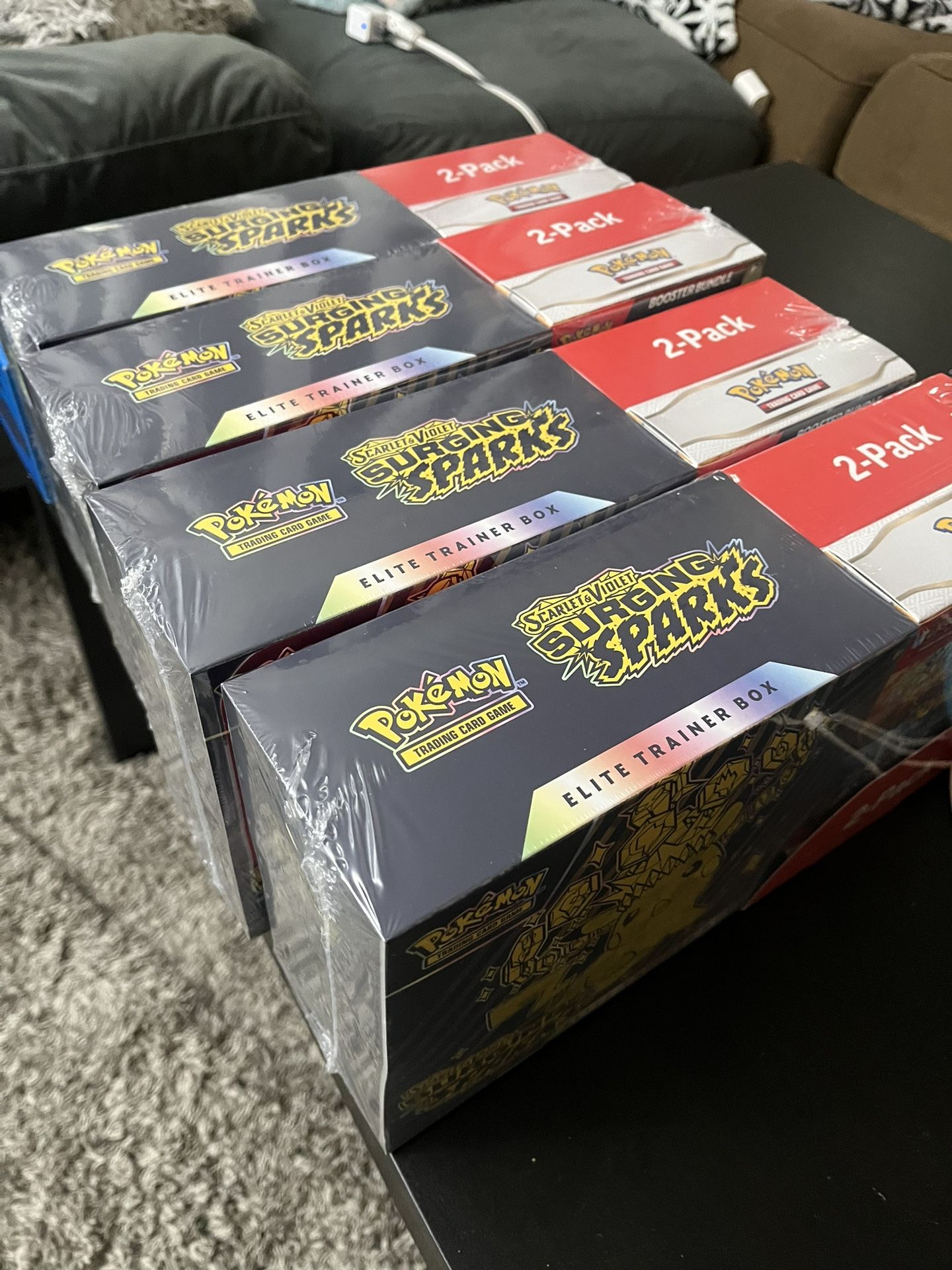 Surging Sparks ETB & Booster Boxes - www.eharrisgallery.com