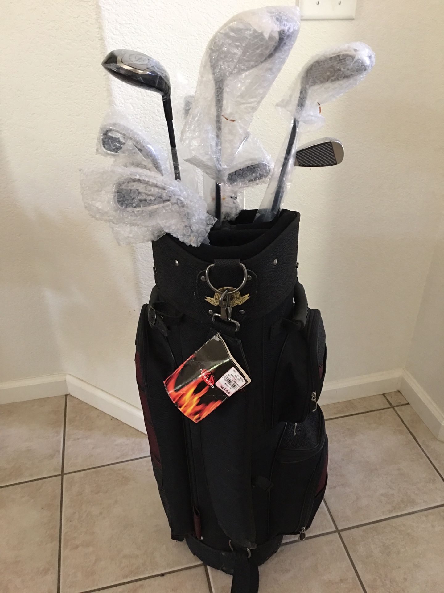 BRAND NEW PureSpin S300 Stainless Golf Set 3-9 PW 1,3,5 Woods & Bag