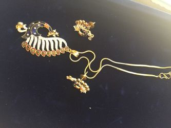 Peacock pendant with ratings